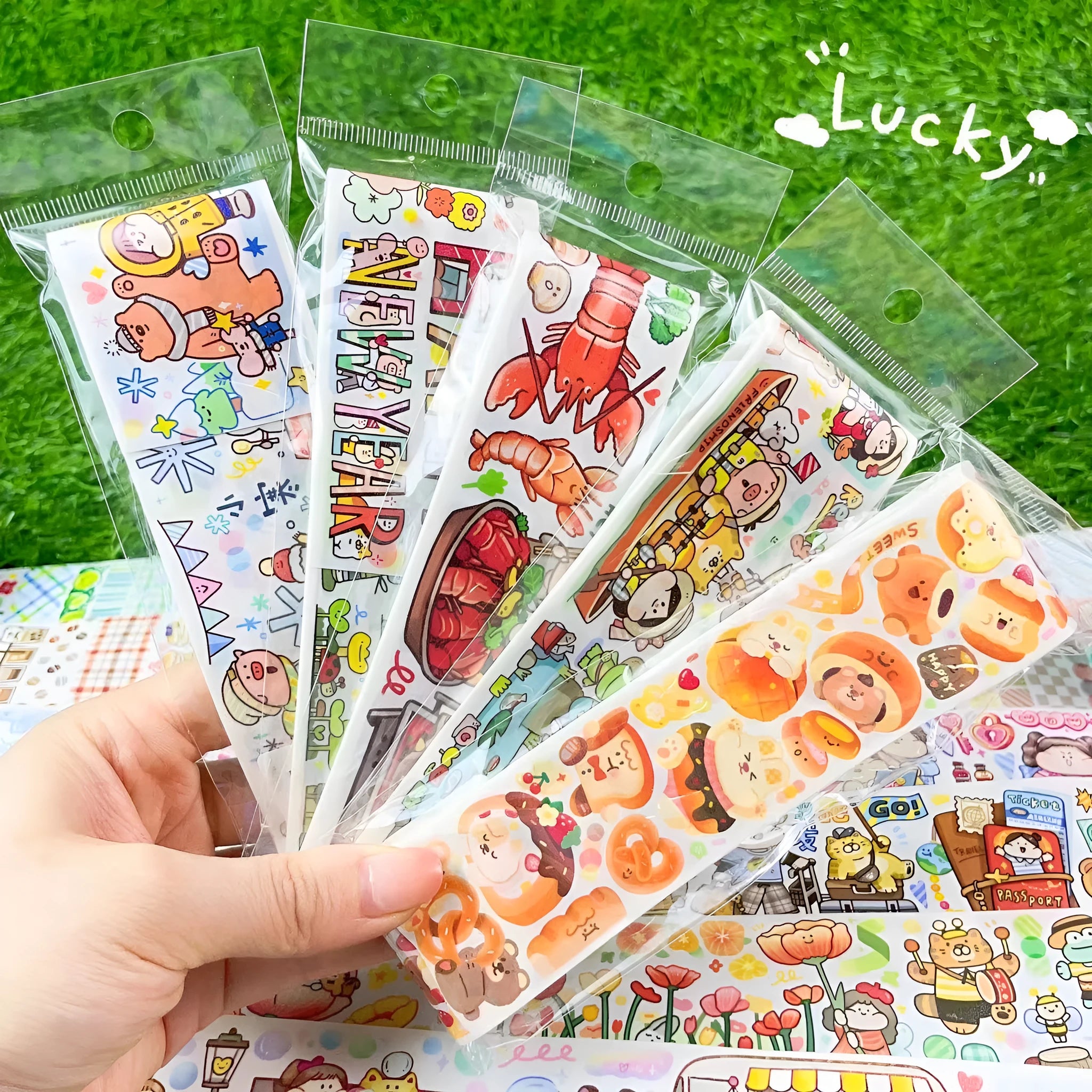 Sheet of cute cartoon character stickers on Japanese paper for medical tape packaging.