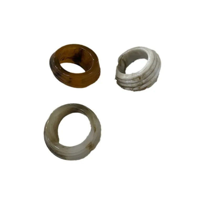 Geometric irregular resin ring in earthy tones with Chinese style retro design