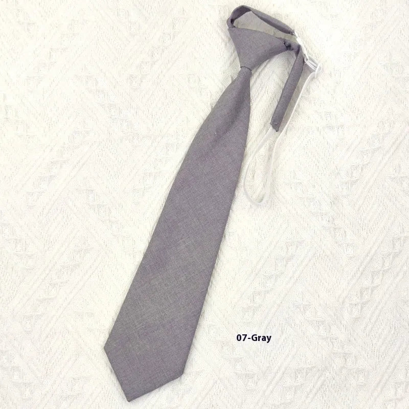 Navy blue cotton bow tie in arrow style with tie-dye processing measuring 35cm by 7cm