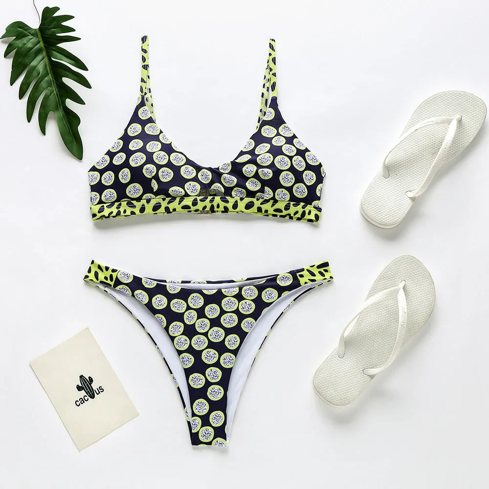 Women's two-piece polyester bikini in black and white dots or red and white stripes.