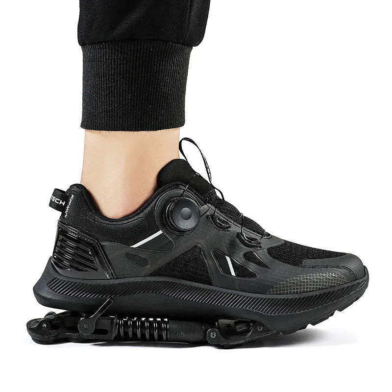 Black running shoes with mesh upper, leather stitching details, and buckle fastening