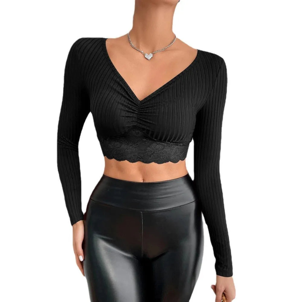Solid colour women's slim fit long sleeve polyester top in black, front view