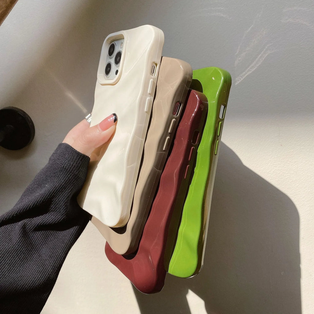 Soft wave pleated TPU phone case for Apple iPhone 17 in a selection of colours including electroplated gold and matte purple.