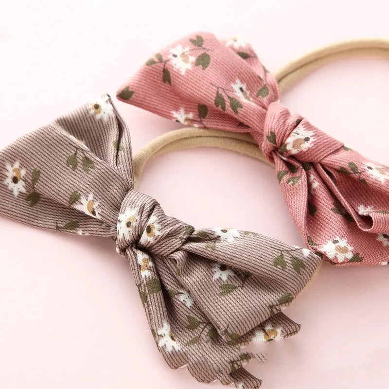 Children's knotted bow hair ring in cloth fabric with printed princess series design