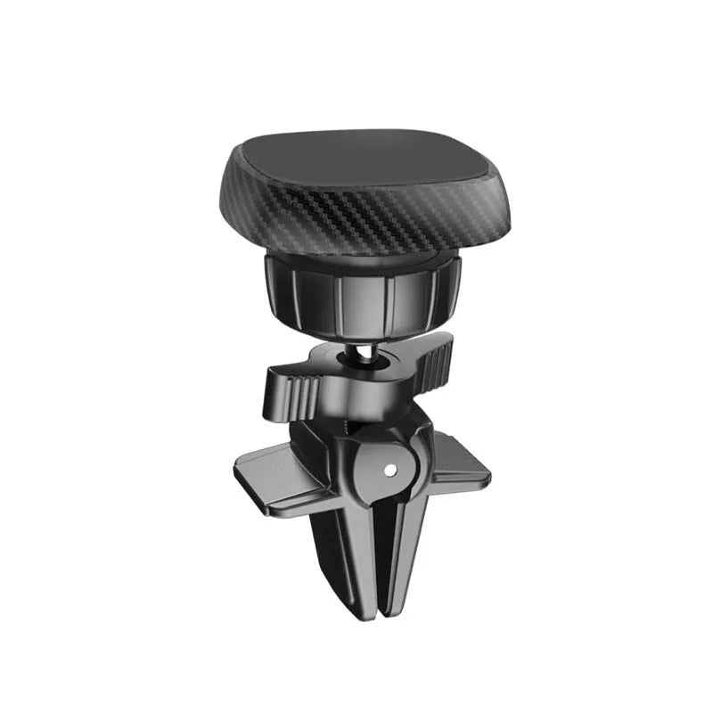 Black magnetic car phone holder attached to a vehicle air vent, showing round head design.