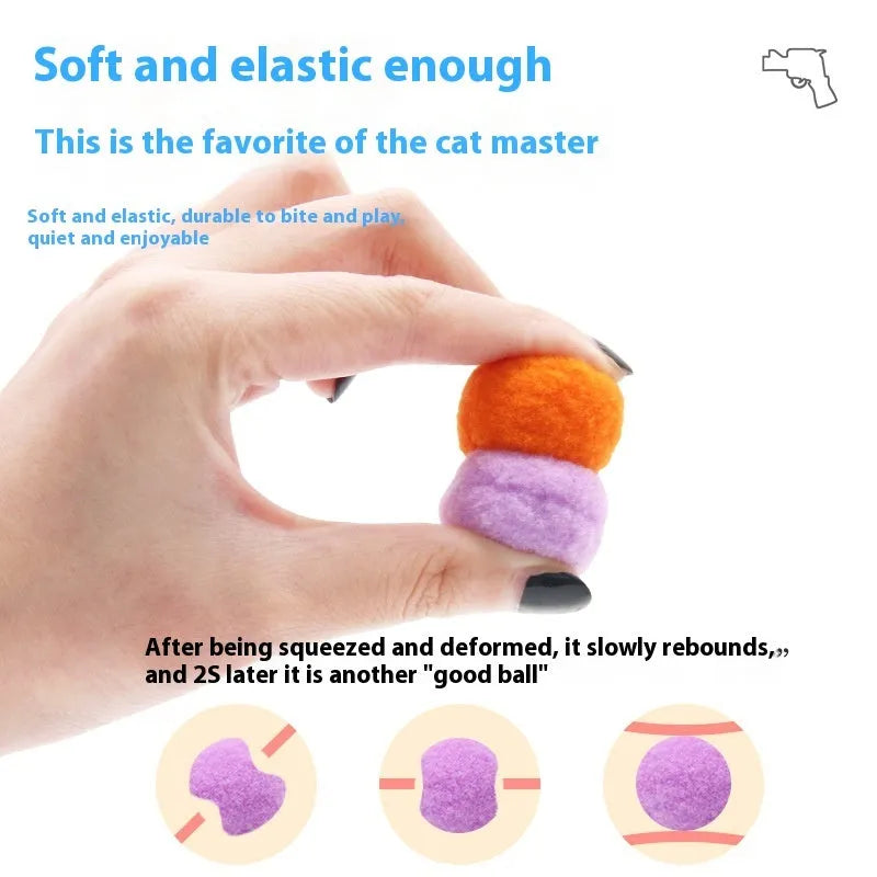 Plush pet toy gun with colourful yarn balls for interactive cat and dog play sessions