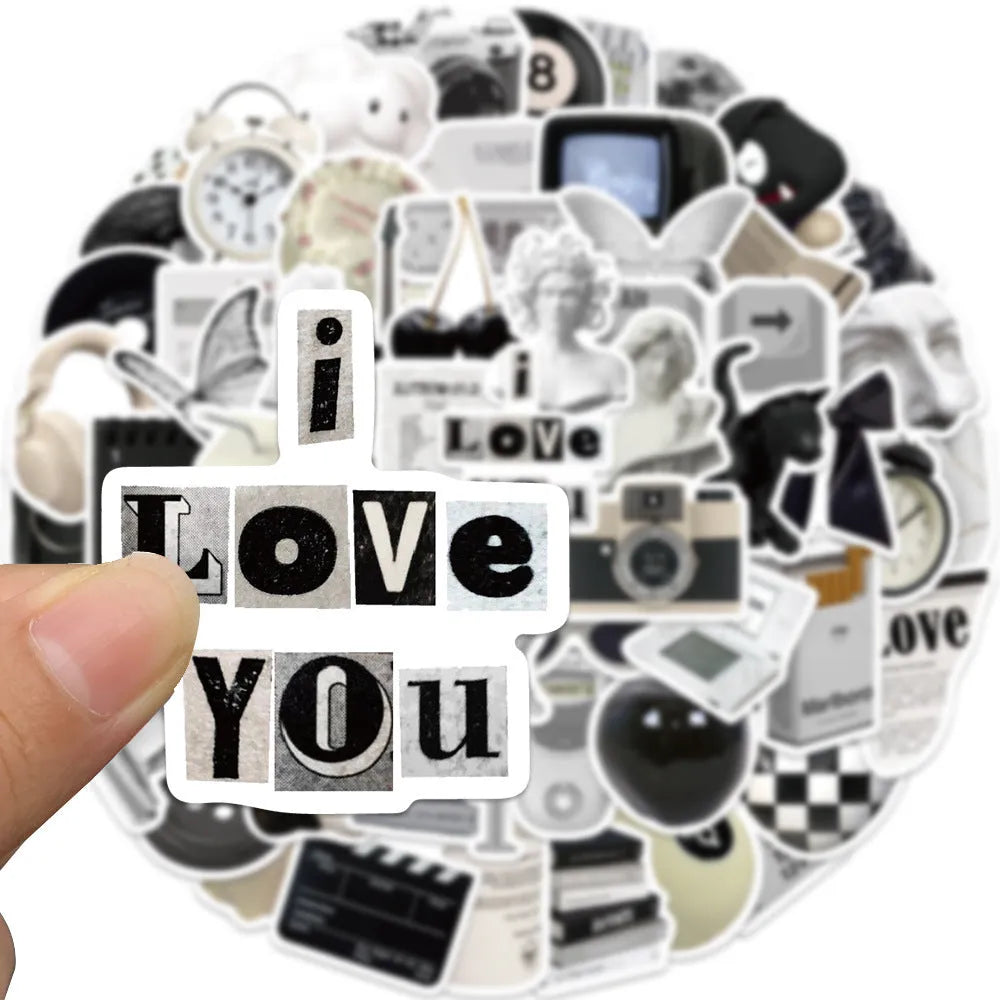61 black and white waterproof PVC stickers for laptops, phones, and luggage decor.