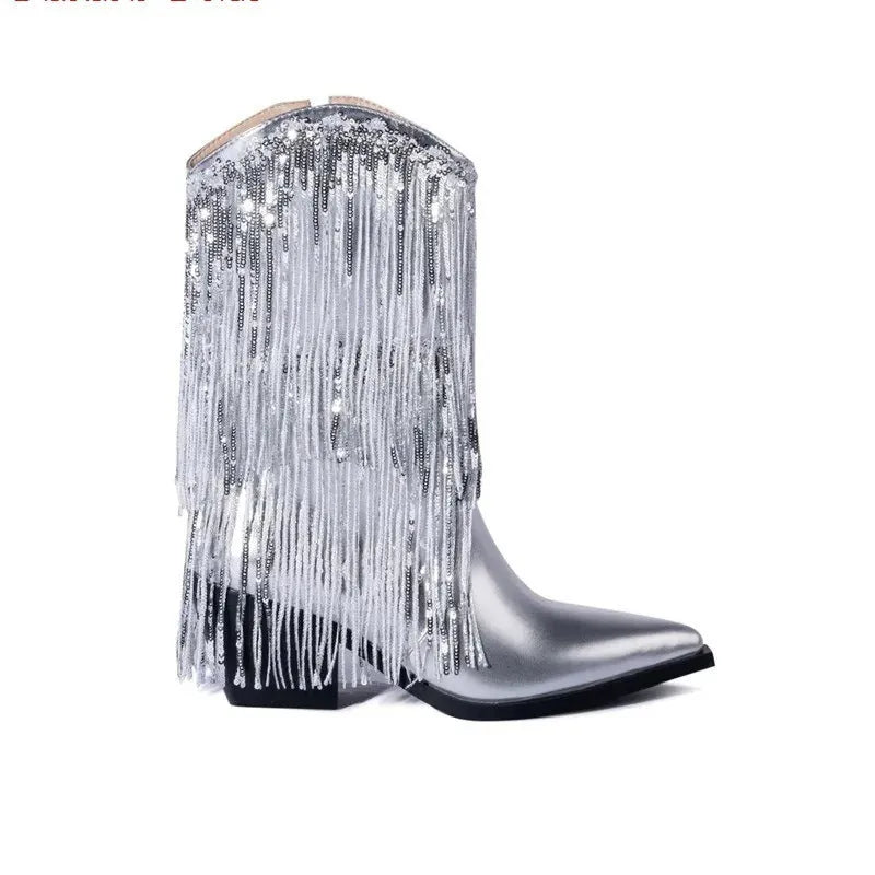 Women's black chunky heel ankle boots with tassel detail and pointed toe on a stiletto heel.