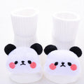 Cotton baby floor socks in various colours and patterns including pink bows, grey stars, and panda design.
