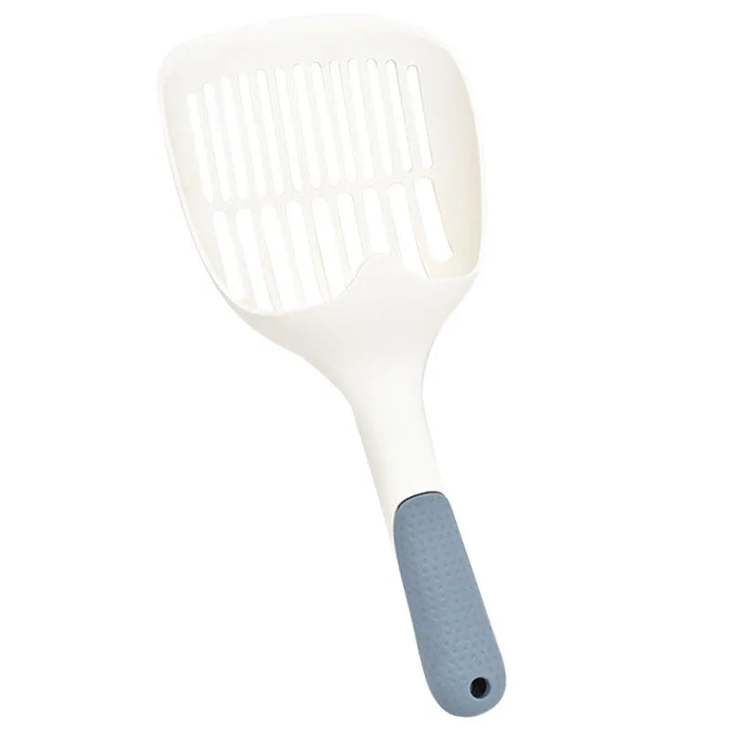 Large white plastic cat litter shovel for scooping clumping tofu cat litter.