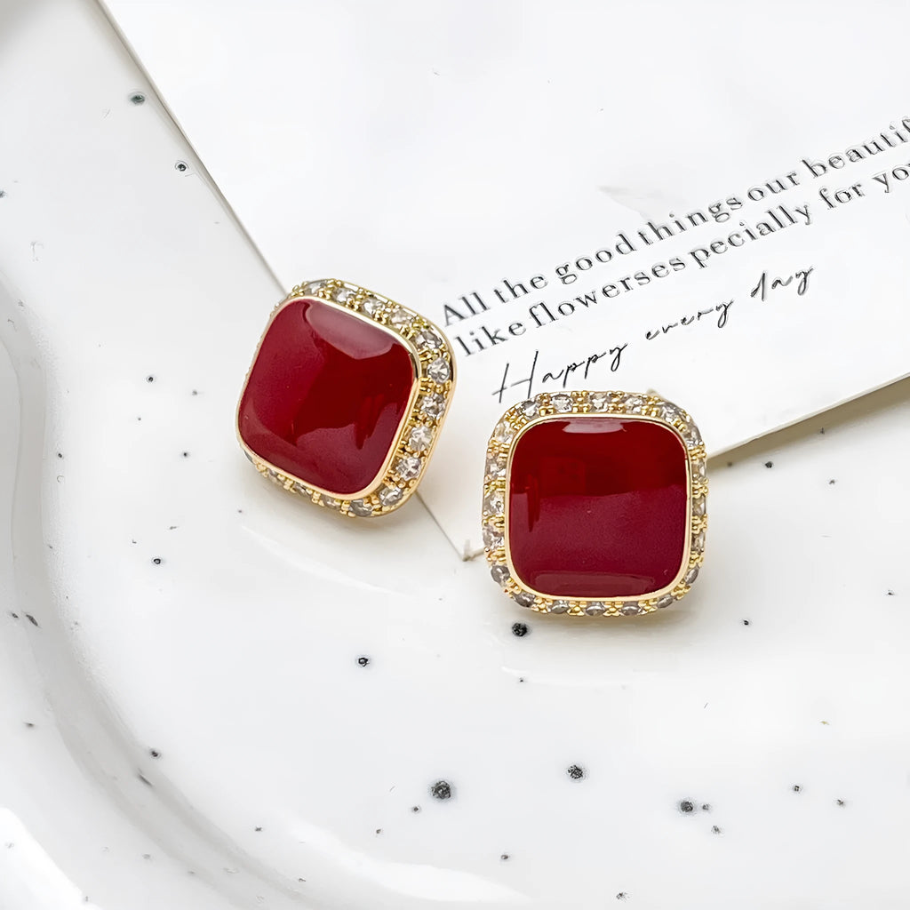 Retro red alloy earrings with geometric square inlaid design for women.