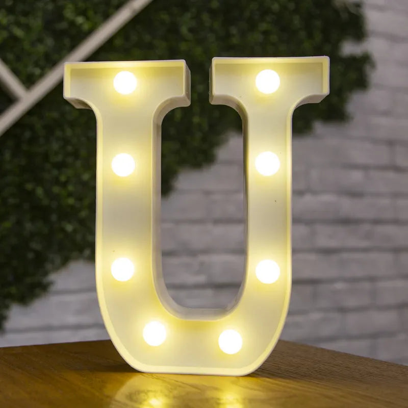 White plastic LED marquee letter sign with warm white glow, 22cm tall