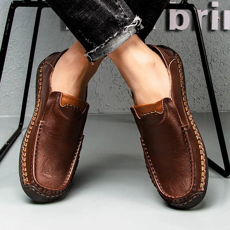 Men's casual leather shoes with soft rubber sole, round toe, two-layer cowhide upper, black colour, side stitching detail