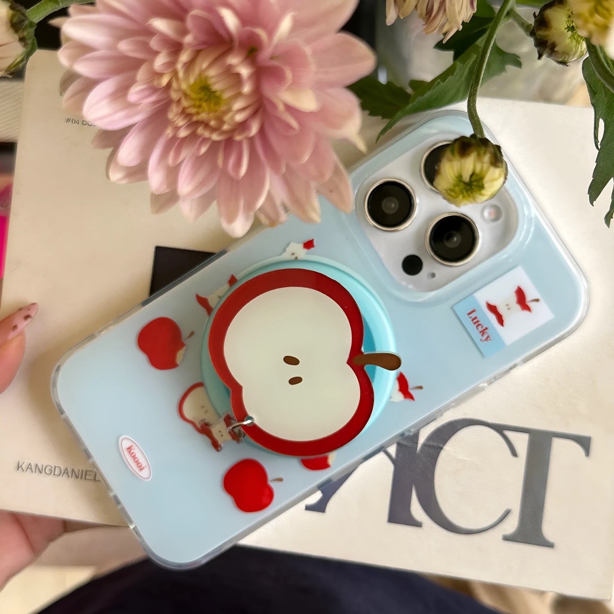Magnetic phone case with blue bottom for Apple iPhone showing embossed finish and side view