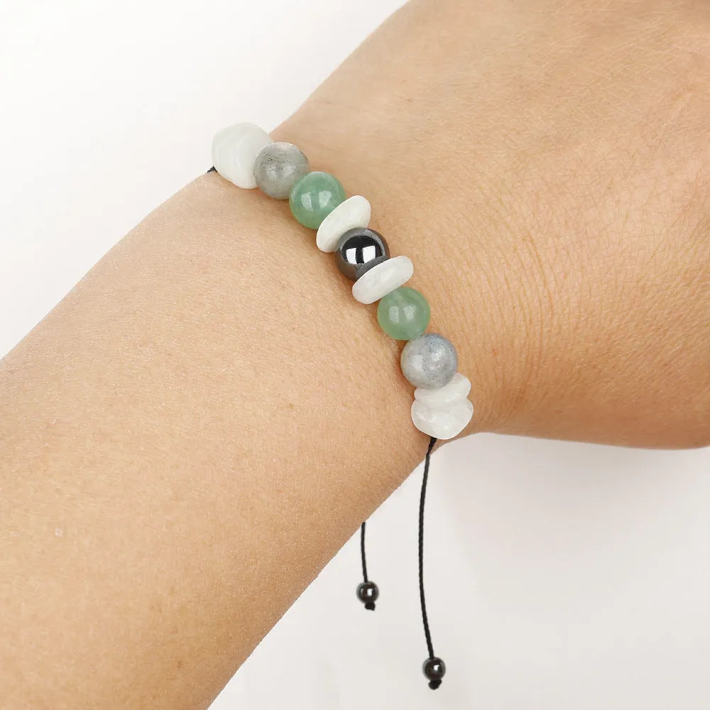 A geometric stone beaded bracelet for women on a wrist, shown in Colour 3906.
