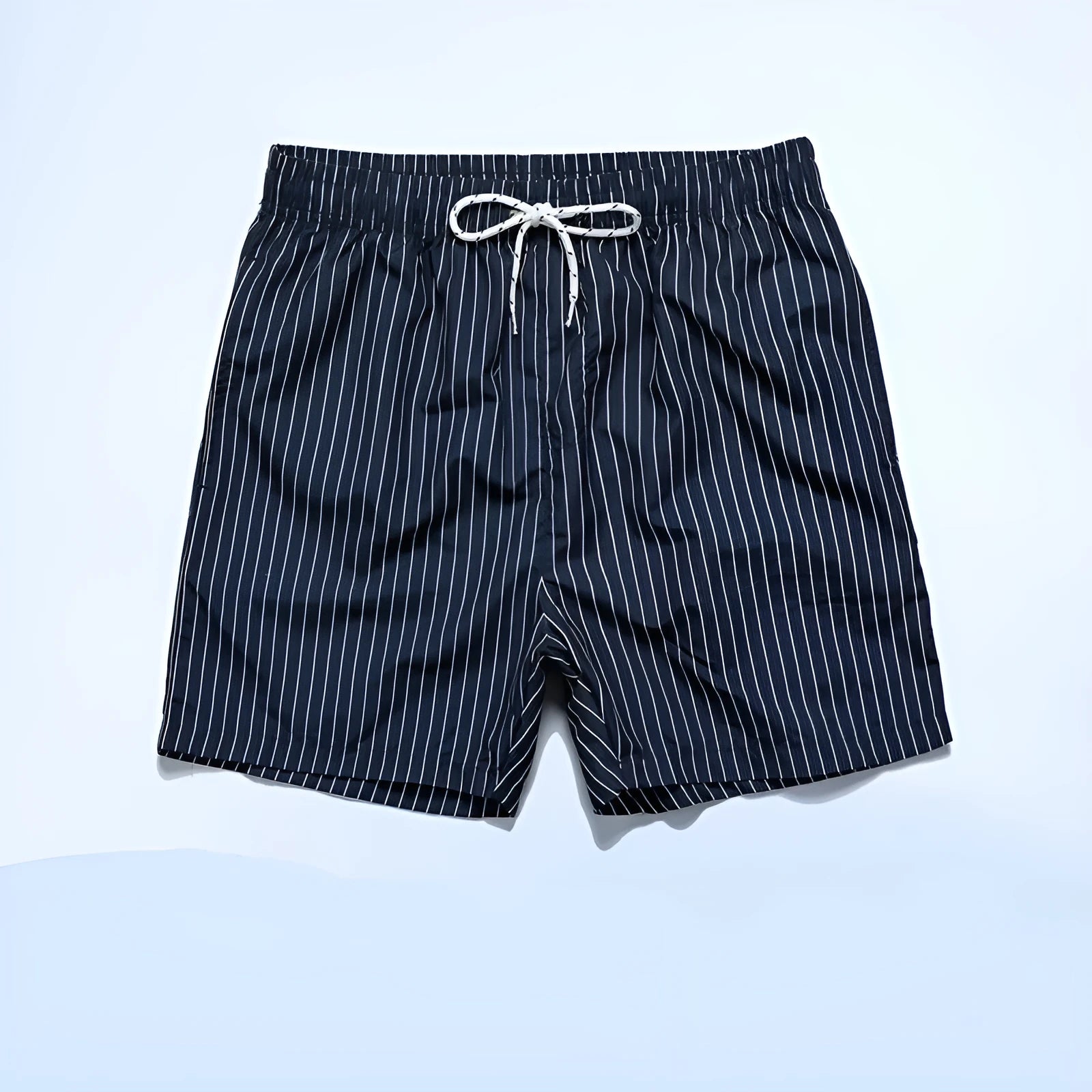 Men's navy blue polyester beach shorts with striped triangle lining and straight leg opening.