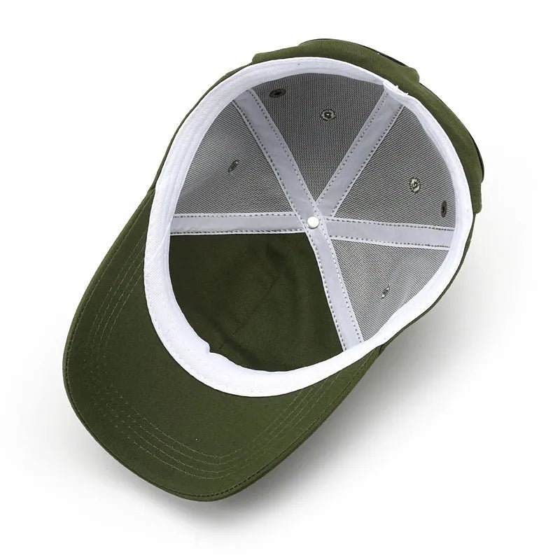 Men's cotton peaked cap in free size with dome crown, satin processing, and letter detailing, shown in monochrome design.