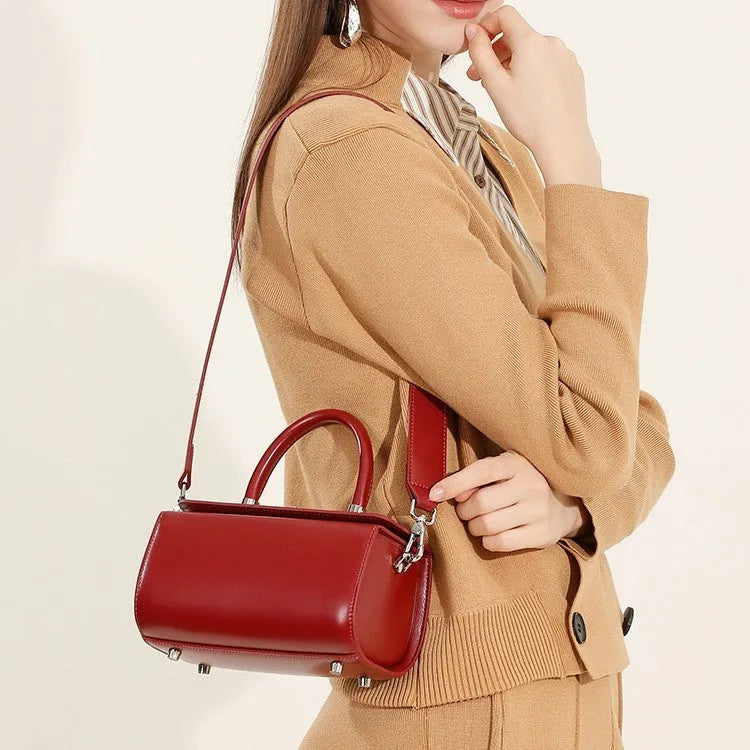 Leather women's crossbody bag with clamshell design in urban simplicity style