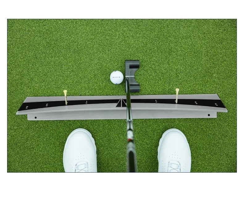 Golf putter trajectory balance simulator with adjustable PVC push rod on a flat surface