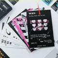 Box containing two different fresh-style postcards with printed messages.