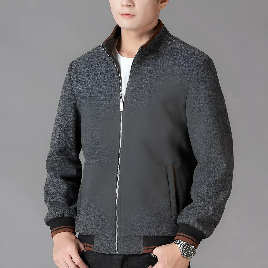 Men's grey sports-style fleece jacket with long sleeves and a side pocket.