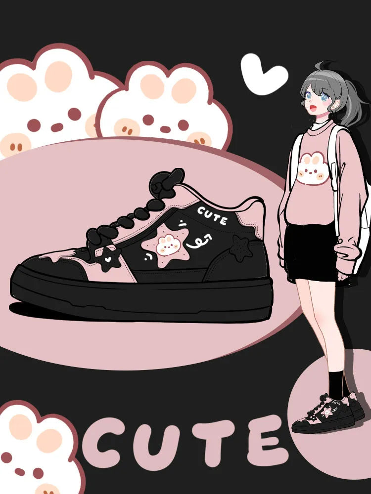Women's black high top sneakers with cartoon anime pattern, colour blocking, cross straps, and lace-up closure