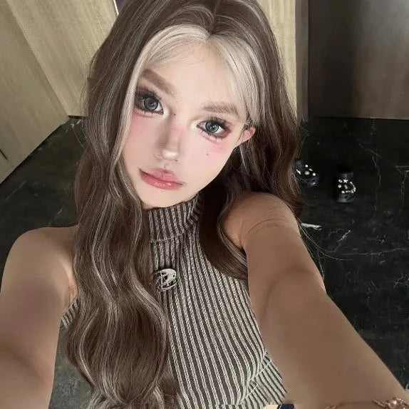Long curly gray golden highlight synthetic wig with lace front design, shown with a hair net.