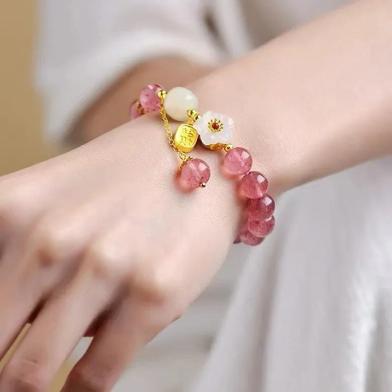 Handmade strawberry quartz crystal bracelet with Hetian jade peach blossom accents in natural style