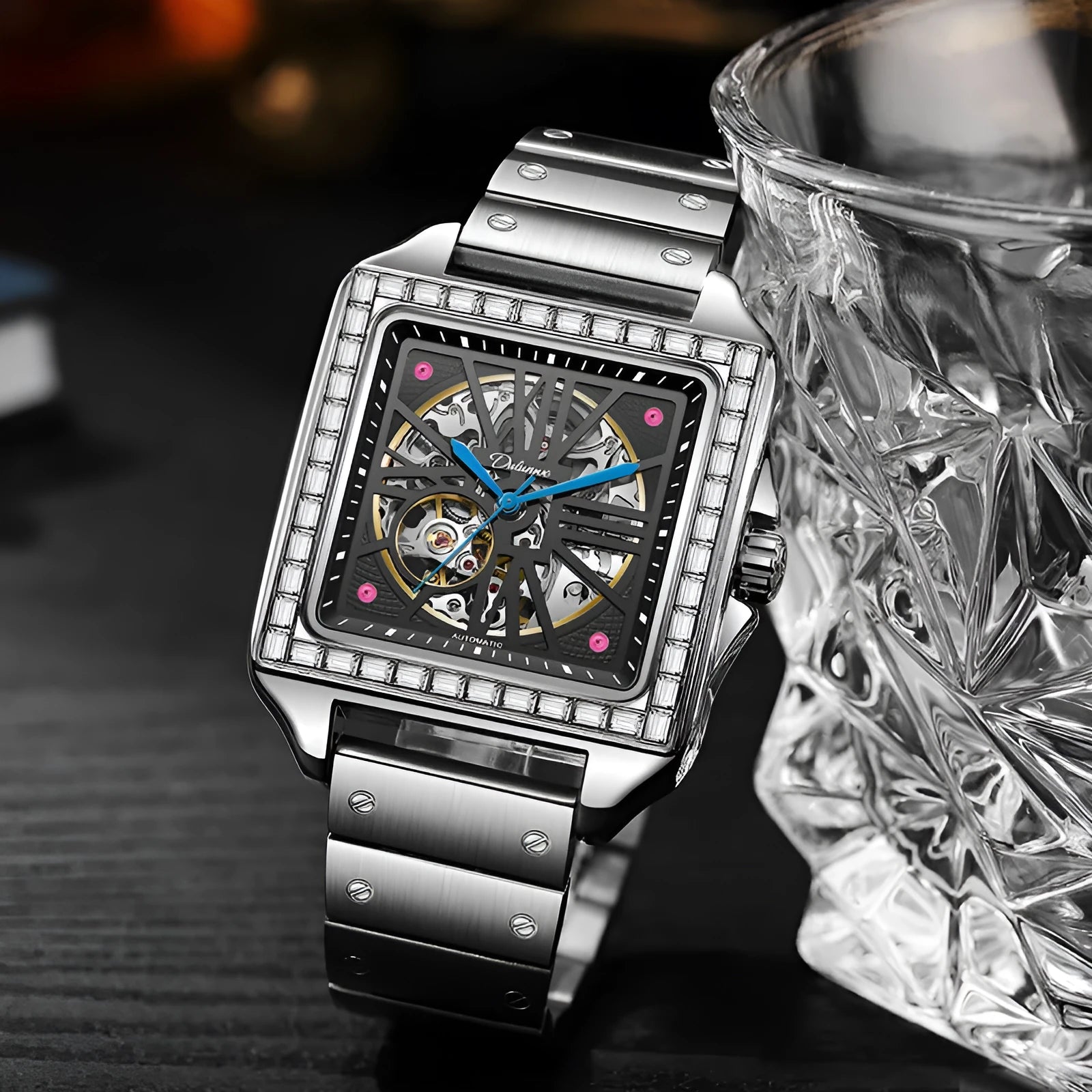 Men's square automatic watch with diamond studs on a black leather strap.