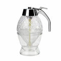 Transparent squeezable honey jar dispenser with 200ml capacity and bee design, sitting on a kitchen counter