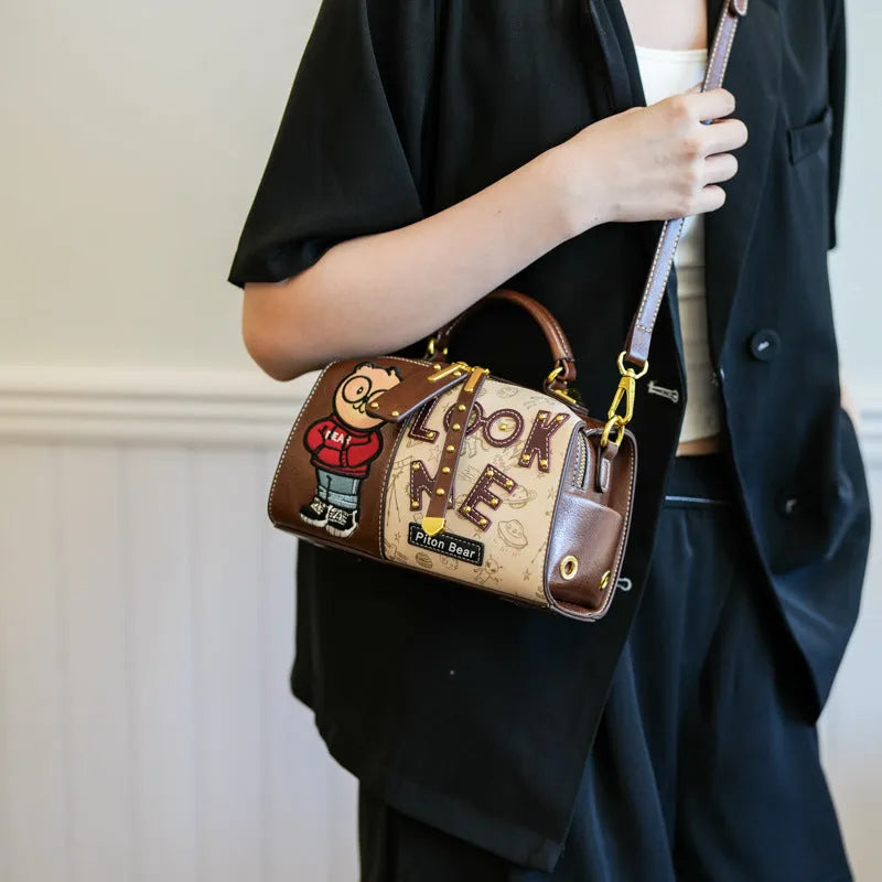 Brown PU handbag with printed cartoon design, horizontal square shape, and single shoulder strap