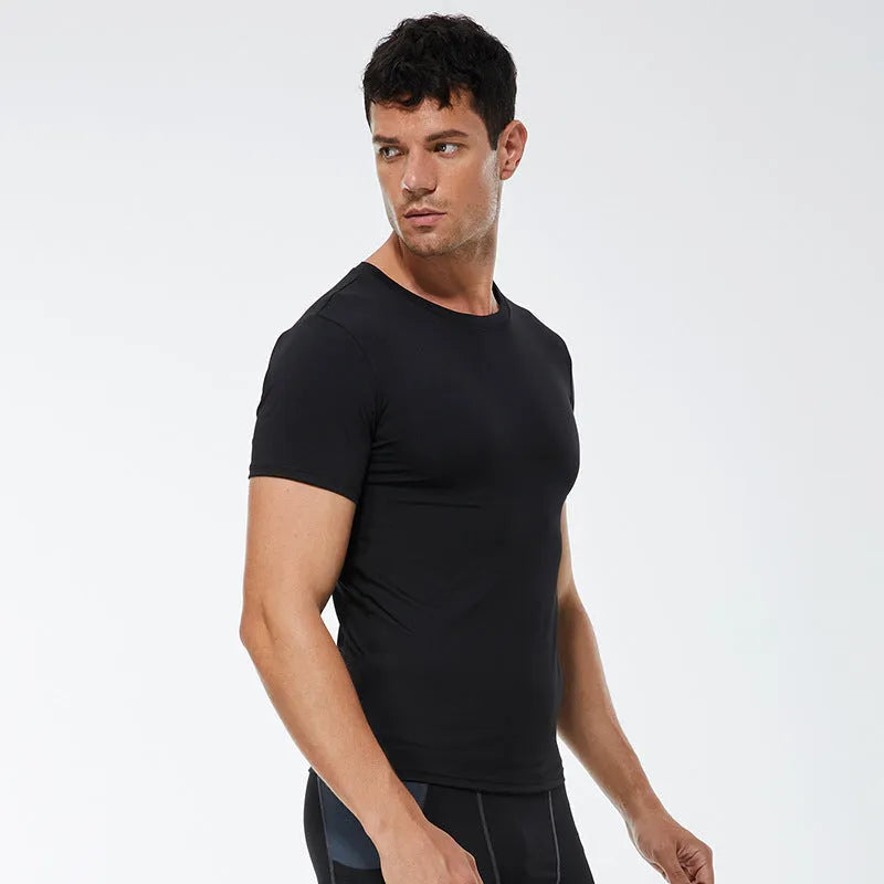 Men's solid colour quick drying short-sleeved fitness shirt in polyester fabric with stretch construction