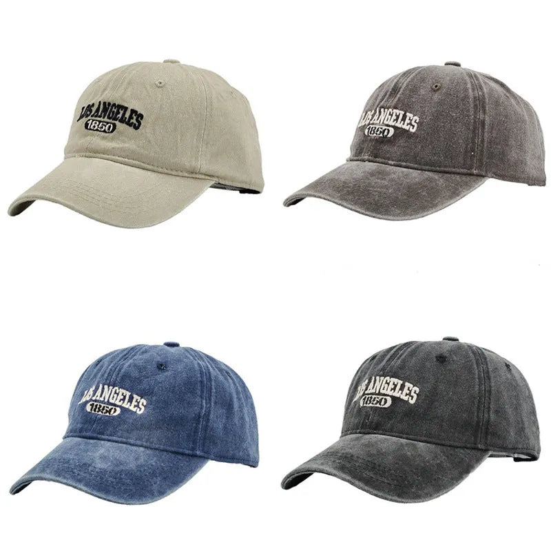 Retro washed distressed peaked cap with adjustable strap on back, shown in beige colour with a conical crown.