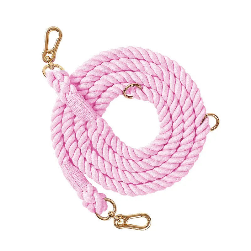 Woven rainbow pattern double-headed dog leash with metal fittings shown alongside mint green and blue purple colour options