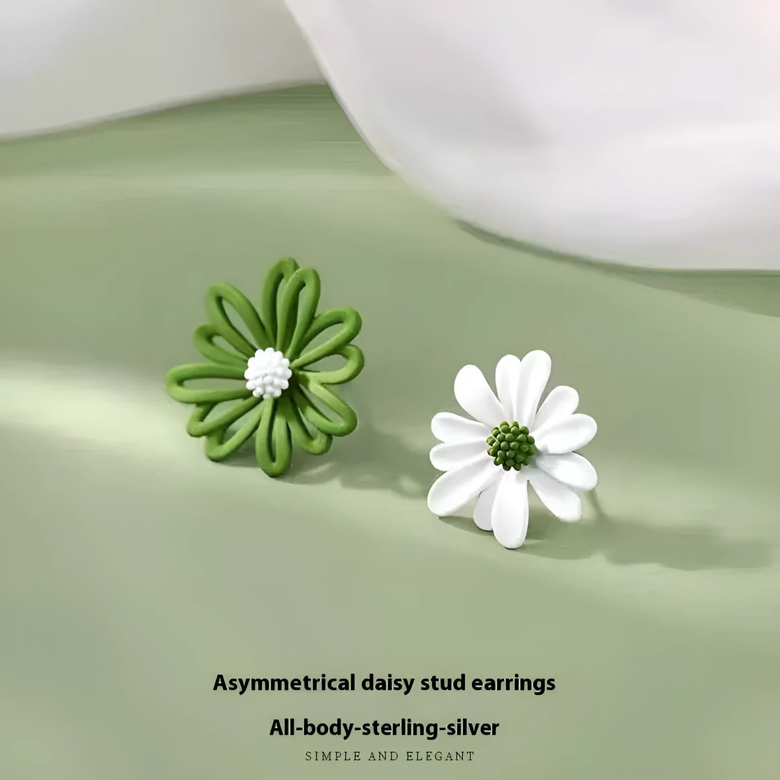 Two-tone flower stud earrings in blue and orange colour combination with cartoon floral design