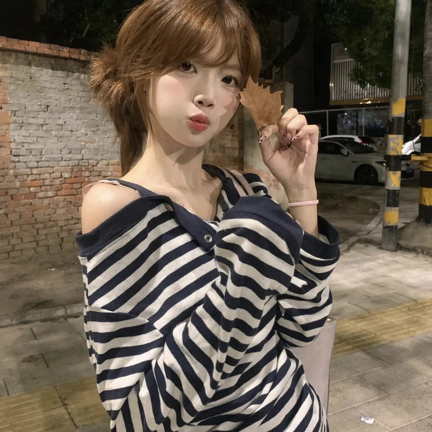 Dark blue oversized women's long-sleeved T-shirt with Korean-style embroidery and stripes.