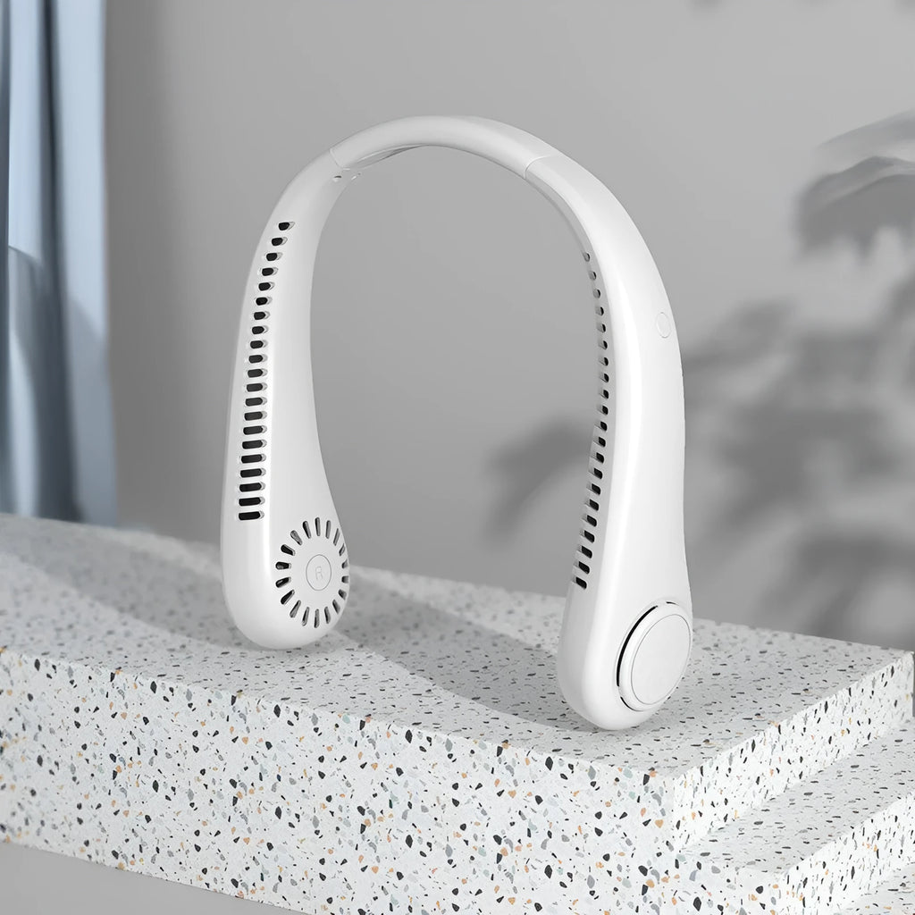 White USB rechargeable bladeless neck fan with flexible neckband worn for personal cooling.