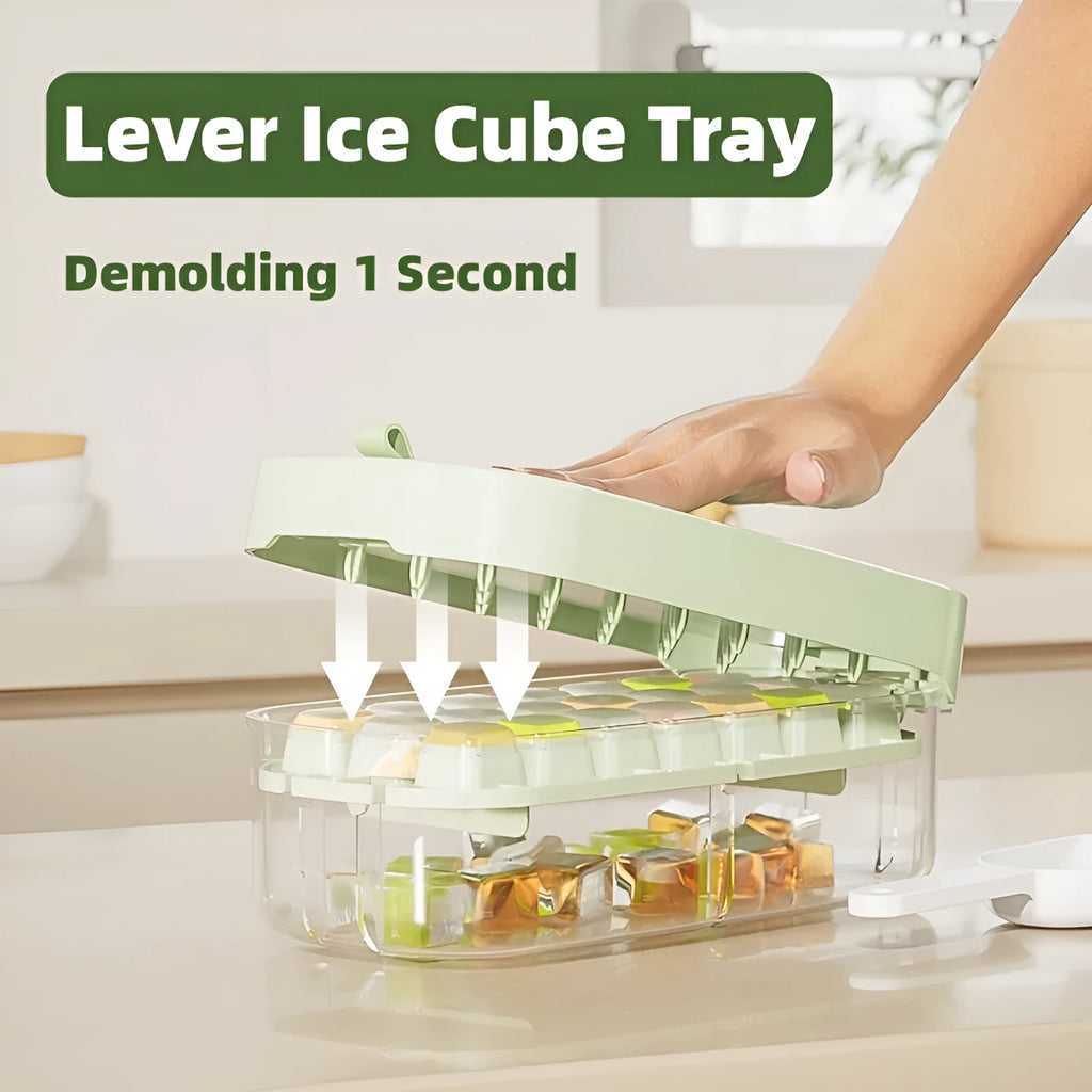 Yellow high-capacity silicone ice cube tray with lid, showing the grid of 1 cm cubes and the ice shovel stored in its slot.