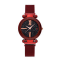 Women's quartz watch with round dial, stainless steel strap, and onion crown on a neutral background
