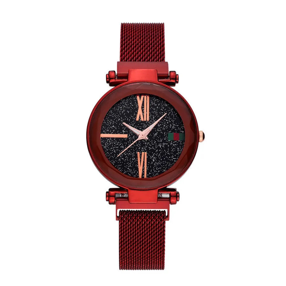 Women's quartz watch with round dial, stainless steel strap, and onion crown on a neutral background