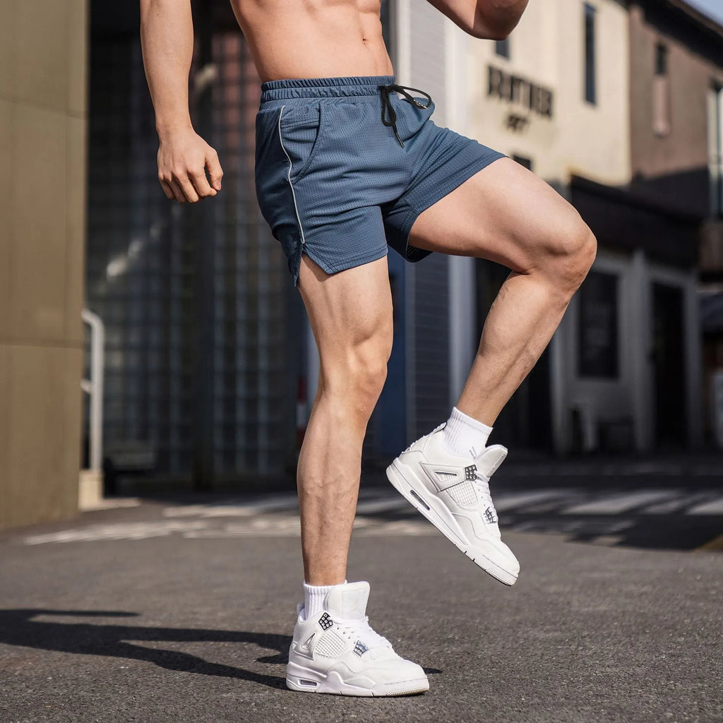 Men's straight-cut polyester sports shorts in black, available in sizes M to 3XL for fitness and casual wear