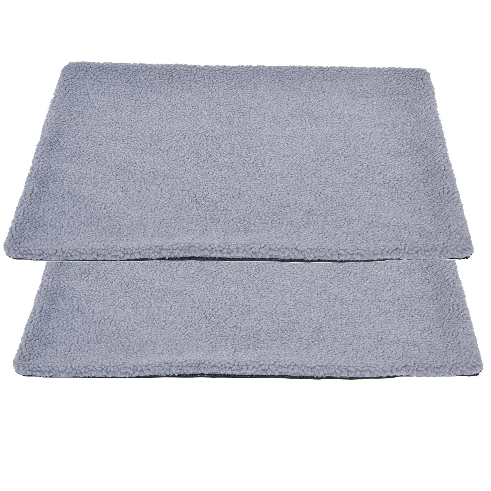 Grey plush self-heating pet pad for cats and dogs on indoor floor