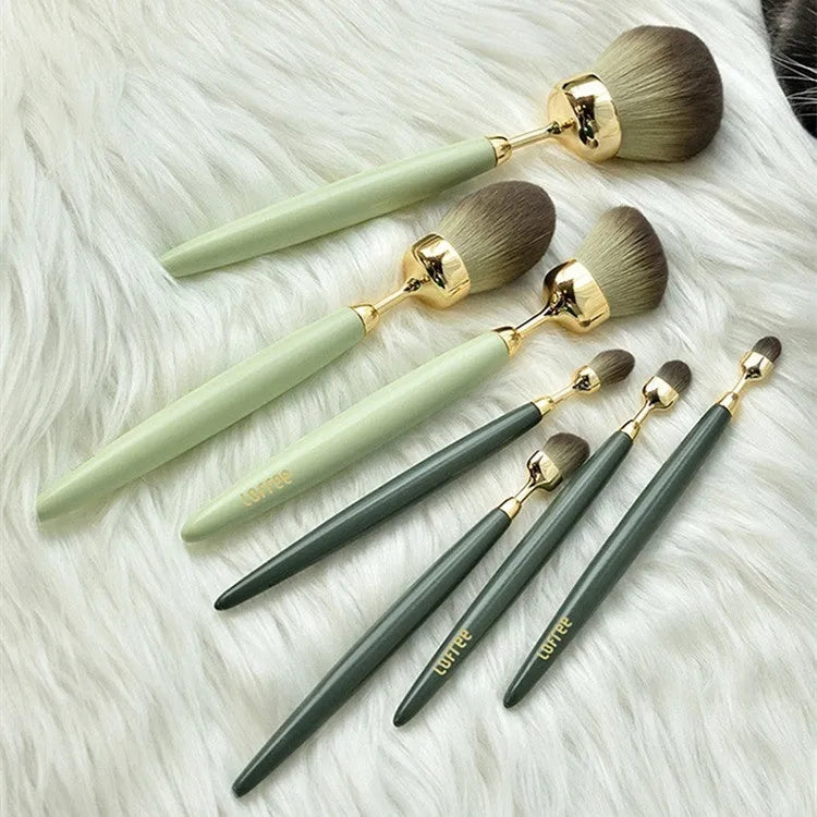 BA 7-piece makeup brush set with beech wood handles and soft bristles on a clean surface