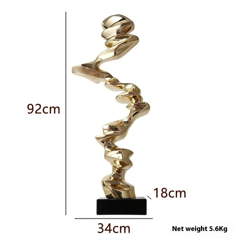 Modern abstract still life sculpture in natural resin and plastic, minimalist design on a table.