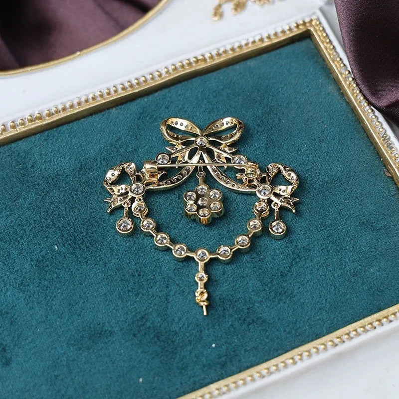 Gold court-style crown tassel brooch with micro-inlaid zircon stones in heart shape on copper base
