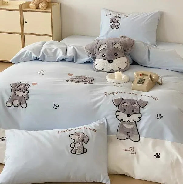 Schnauzer dog cartoon pattern embroidered on a complete thickened cotton bedding set showing quilt cover and pillowcases.