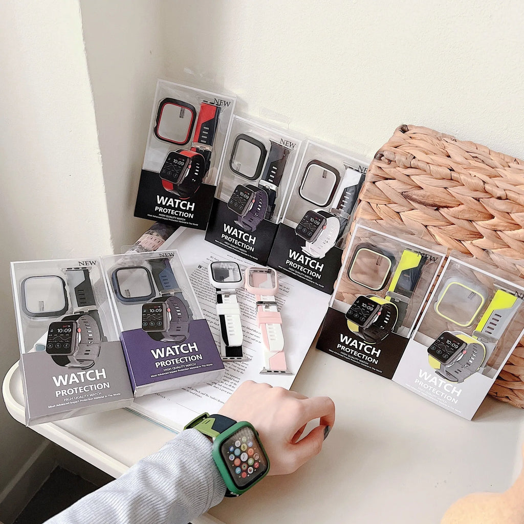 Two-tone silicone protective case for Apple Watch in black and white on a flat surface