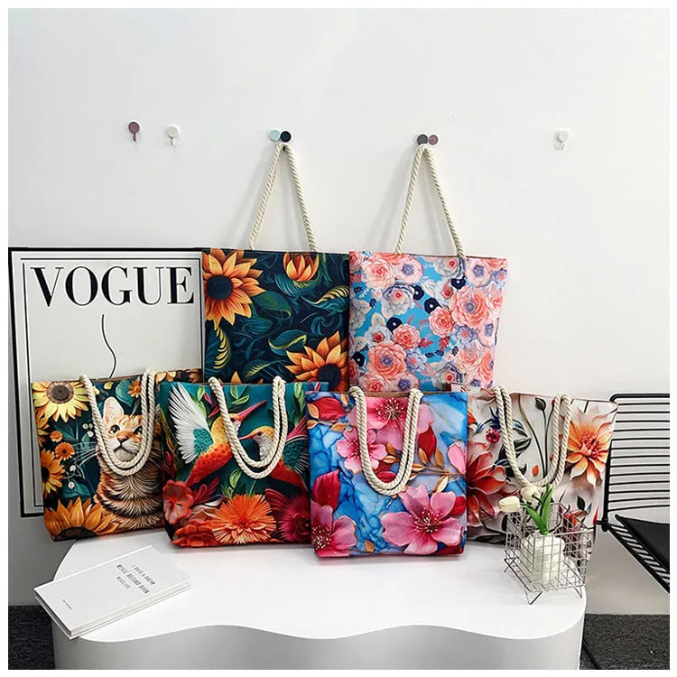 A soft cotton and linen string shoulder handbag with two straps and an open outer pocket.