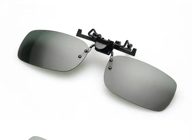 PC plastic clip-on sunglasses designed to fit over prescription glasses for driving and outdoor use.