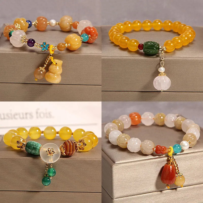 Khaki coloured crystal bracelet for women with an adjustable gold silk cord fastening.